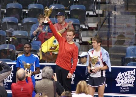 1st-place Reid Coolsaet, 2nd-place Terence Attema and 3rd-pace Giitah Macharia accept their trophies