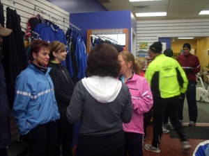 Esther giving last minute running advice to her running family