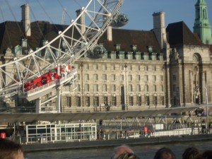 The London eye near Westminster Abbey and the British Houses of Parlimant