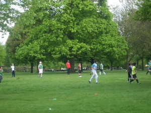 Kids playing football in Kensington Palace Park